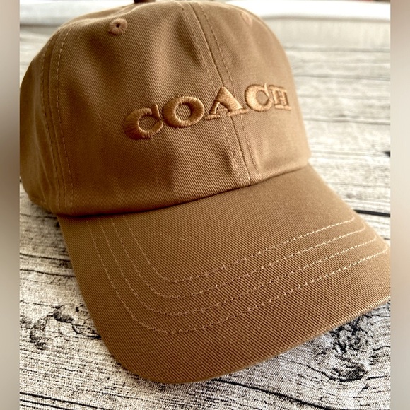 Coach Accessories - NWT! Coach embroidered baseball hat - Tan. Authentic, original tags attached